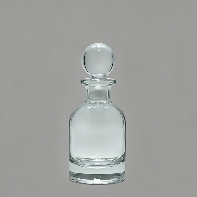 Flacon de parfum en verre transparent avec bouchon rond pour usage aromathérapie à domicile